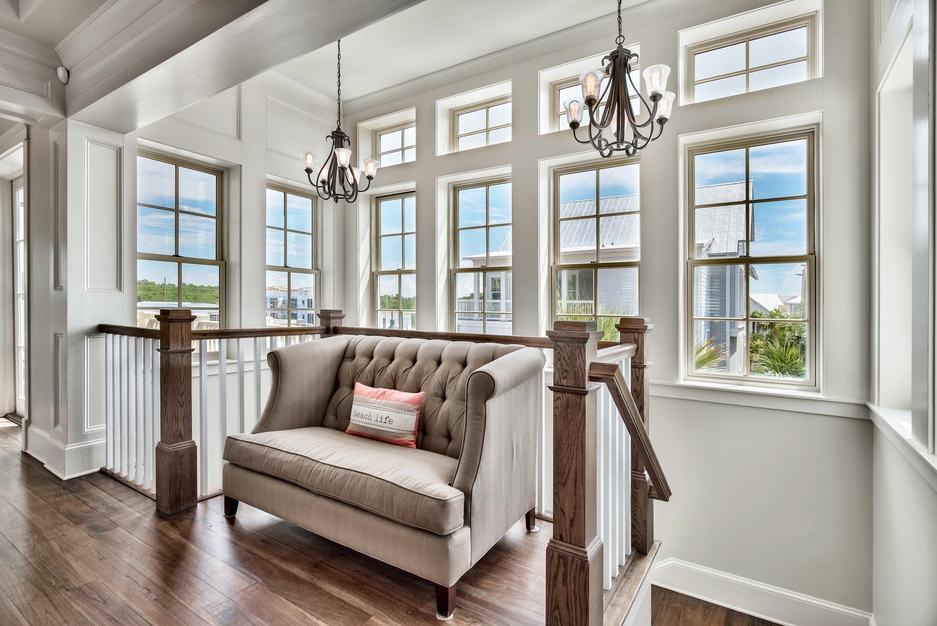 70 Pleasant Street Inlet Beach, FL 32461 - Photo 25 of 38 a living room with furniture and floor to ceiling windows