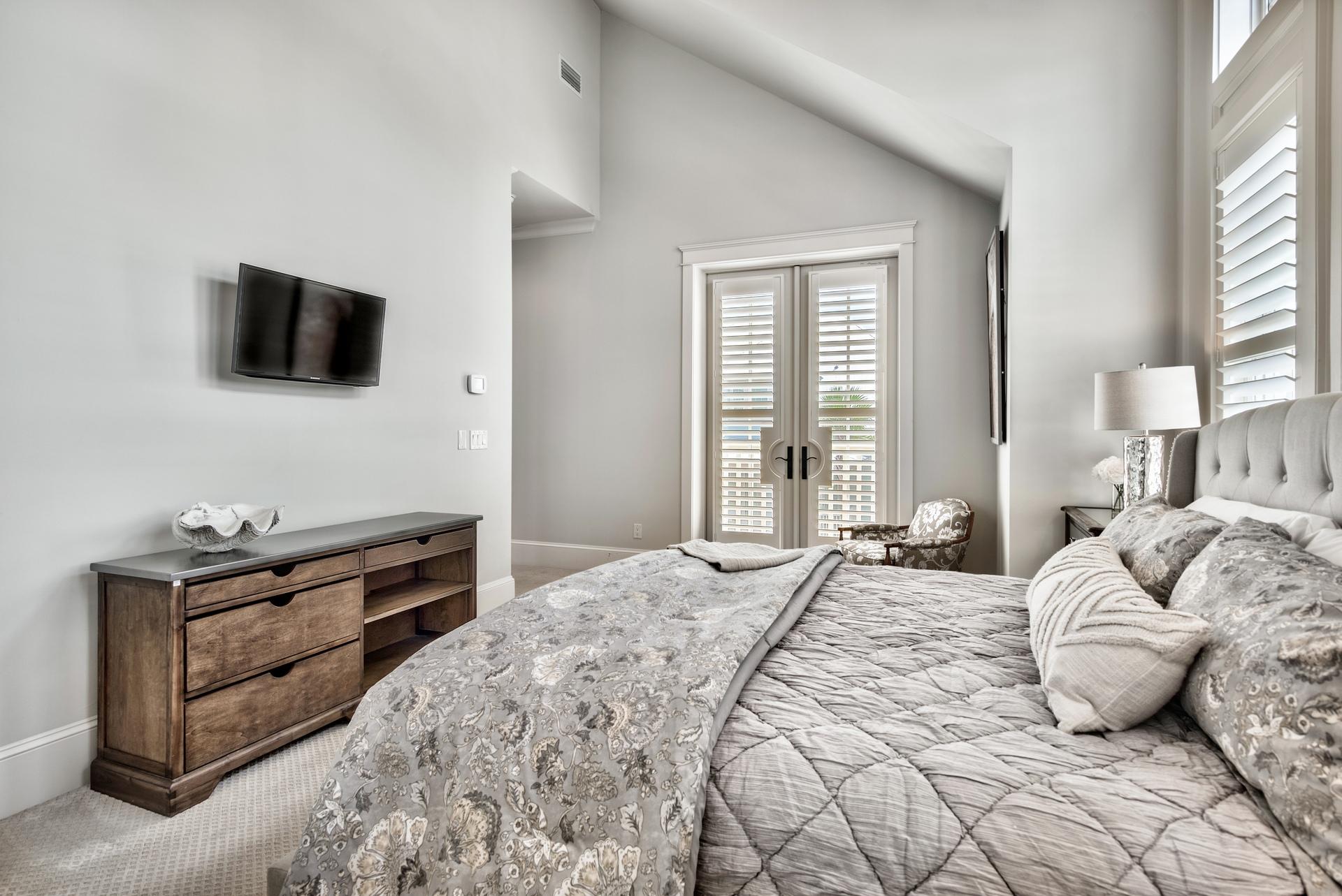 70 Pleasant Street Inlet Beach, FL 32461 - Photo 29 of 38 a bedroom with a bed and a flat screen tv