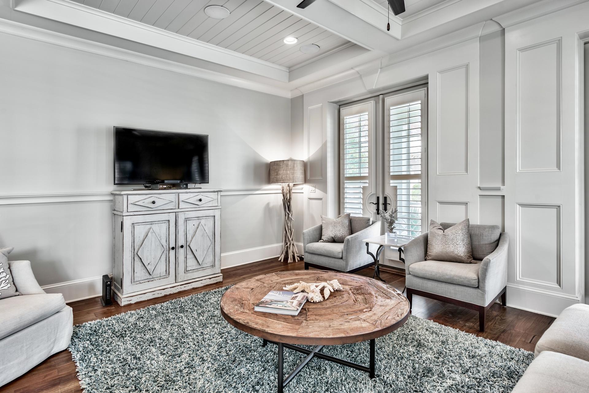 70 Pleasant Street Inlet Beach, FL 32461 - Photo 5 of 38 a living room with furniture and a flat screen tv