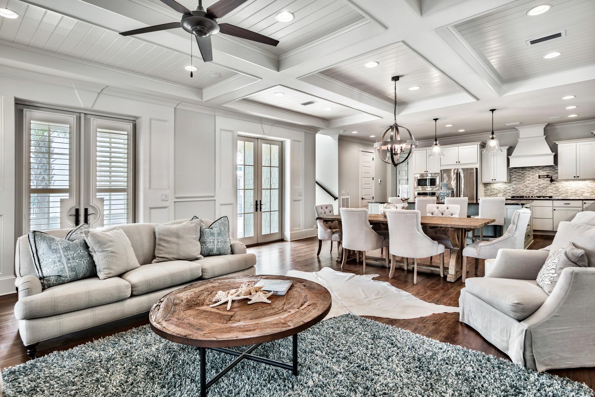70 Pleasant Street Inlet Beach, FL 32461 - Photo 9 of 38 a living room with furniture a rug and a chandelier