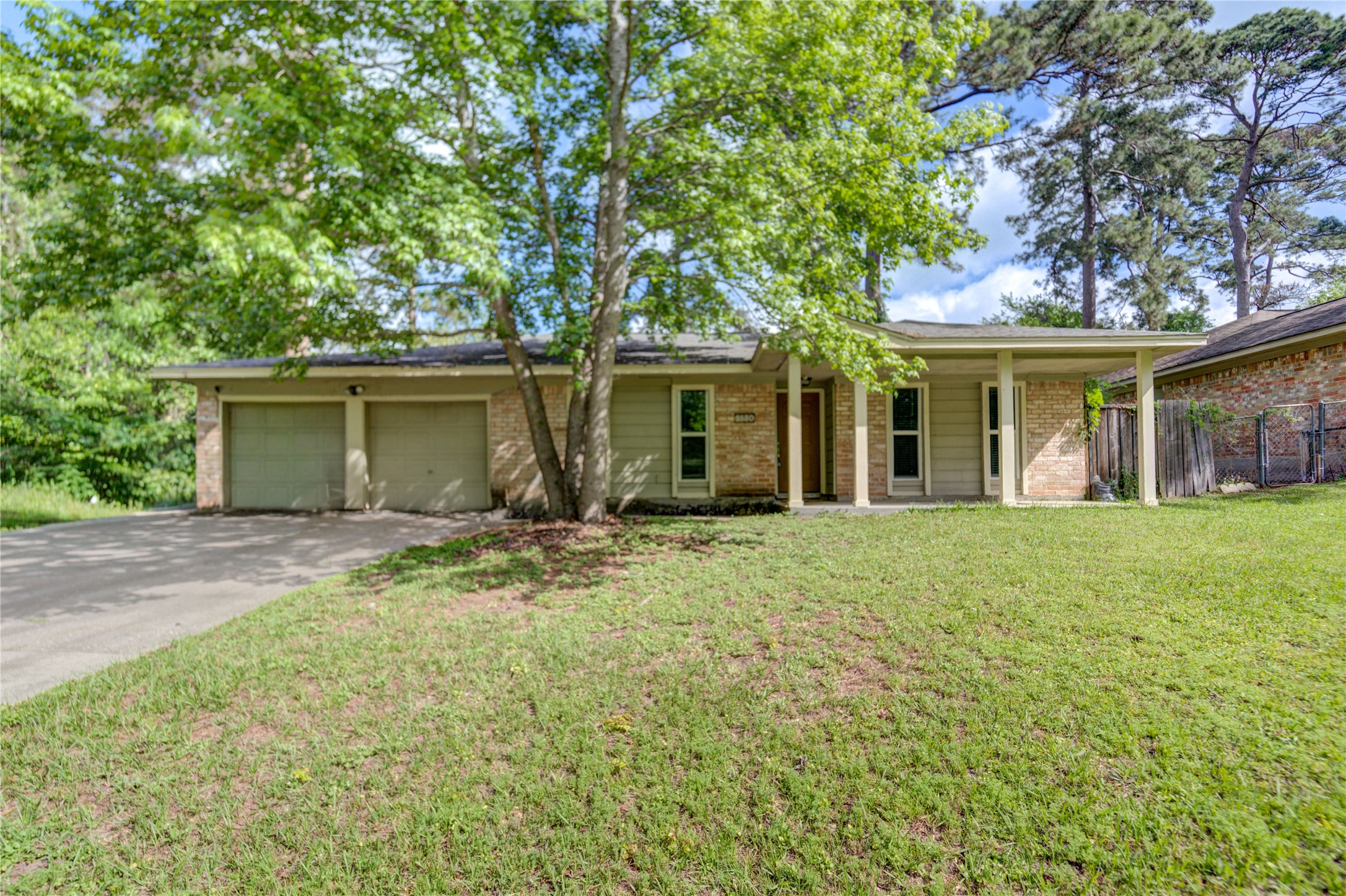 3530 Kentwood Drive Spring, TX 77380 - Photo 3 of 37 front view of a house with a yard