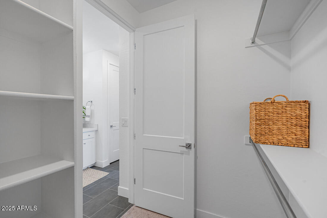 1247 East Colter Street, Unit 1 Phoenix, AZ 85014 - Photo 18 of 32 a view of walk in closet