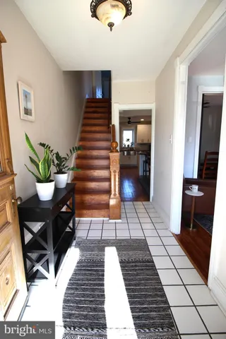 a view of a hallway with seating space