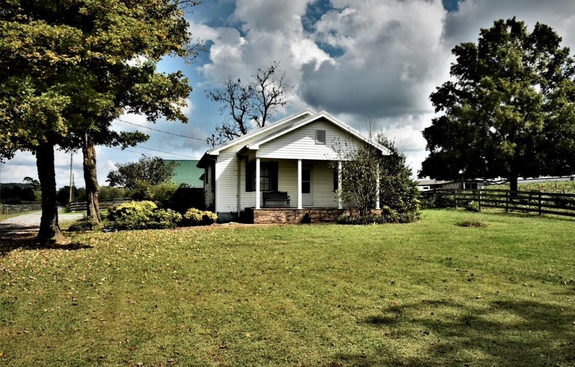3833 Spring Place Road Southeast Cleveland, TN 37323 - Photo 2 of 8 a view of a house with swimming pool and sitting area