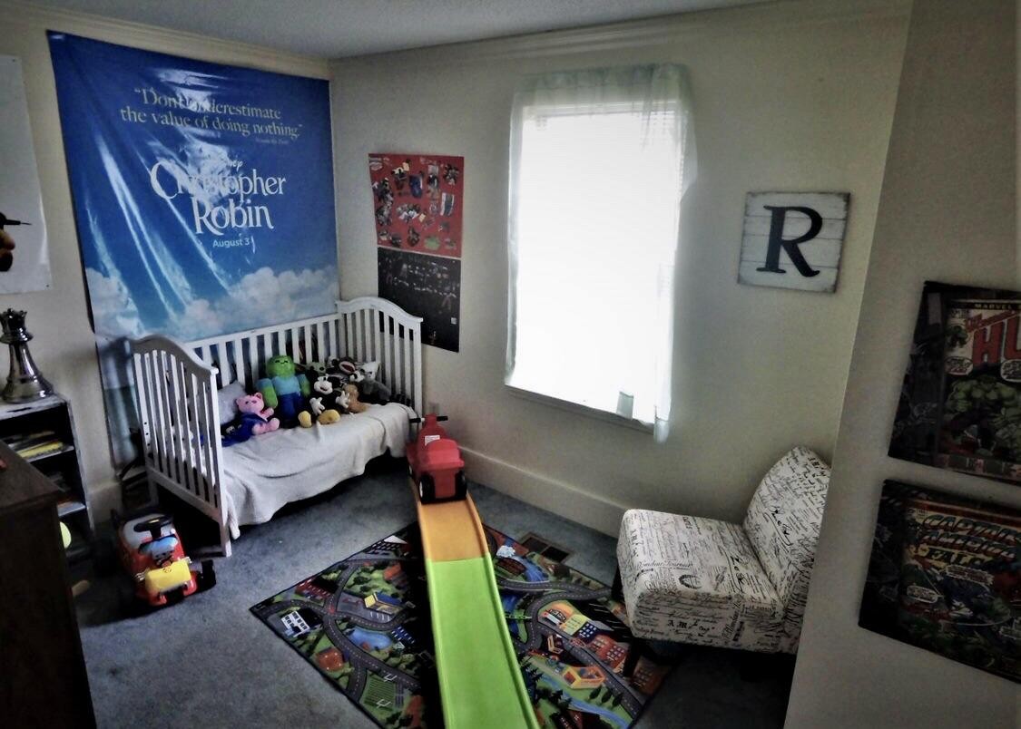 3833 Spring Place Road Southeast Cleveland, TN 37323 - Photo 7 of 8 a bedroom with furniture and a wooden floor