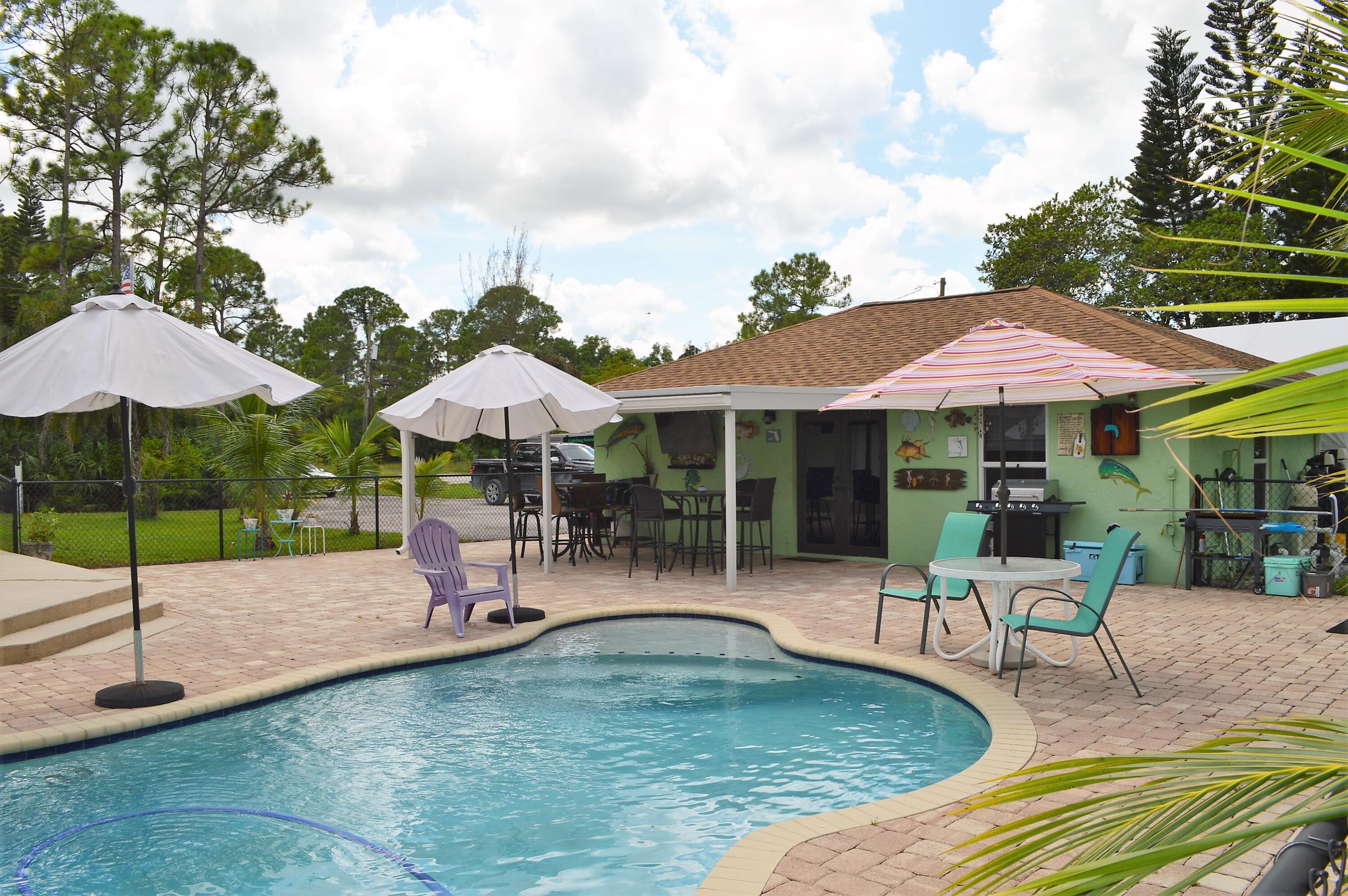 14743 76th Road North Loxahatchee, FL 33470 - Photo 1 of 47 Tropical Pool