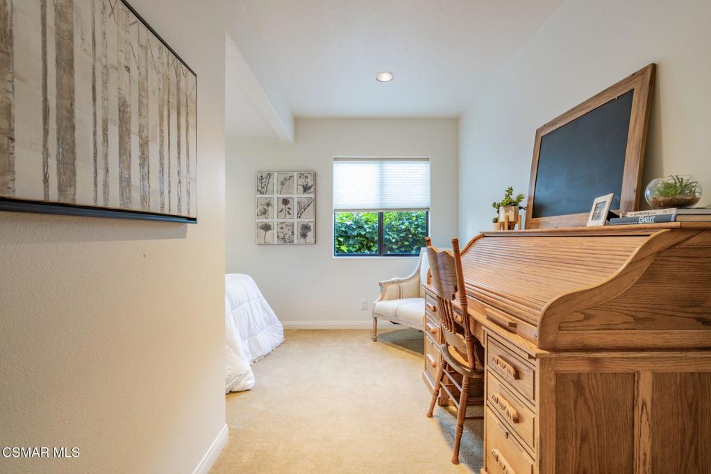 6078 Peppertree Lane Simi Valley, CA 93063 - Photo 20 of 59 a bedroom with a bed and a flat tv screen on dresser