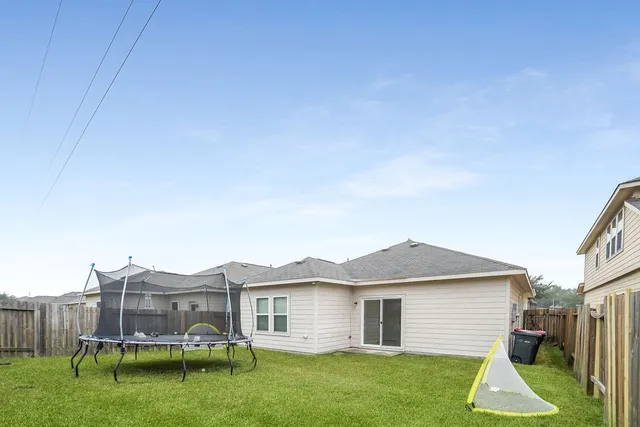 a view of a yard in front of a house