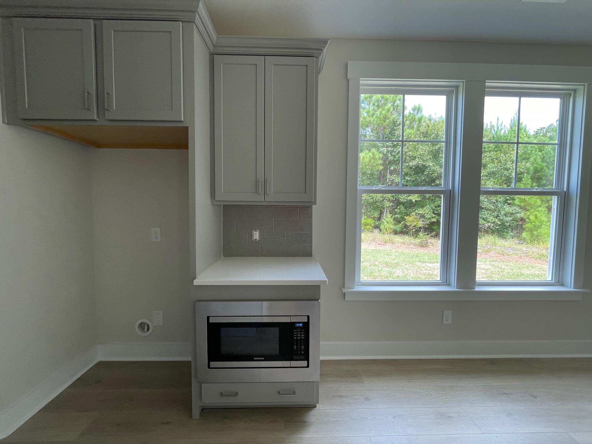 1105 Irving Manigault Road McClellanville, SC 29458 - Photo 5 of 26 Kitchen Cabinets