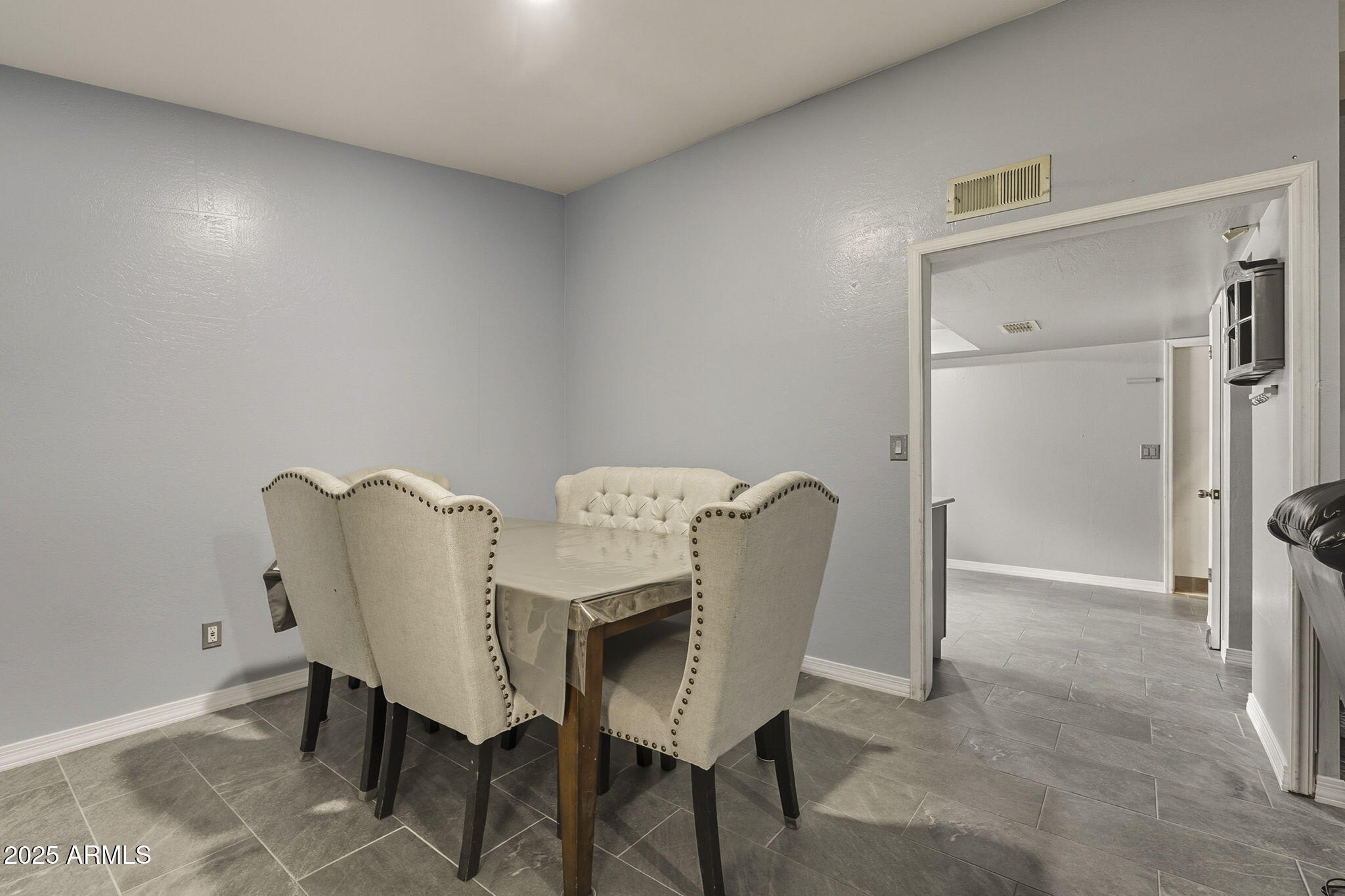2103 West Palomino Drive Chandler, AZ 85224 - Photo 11 of 46 a view of a room with furniture and wooden floor
