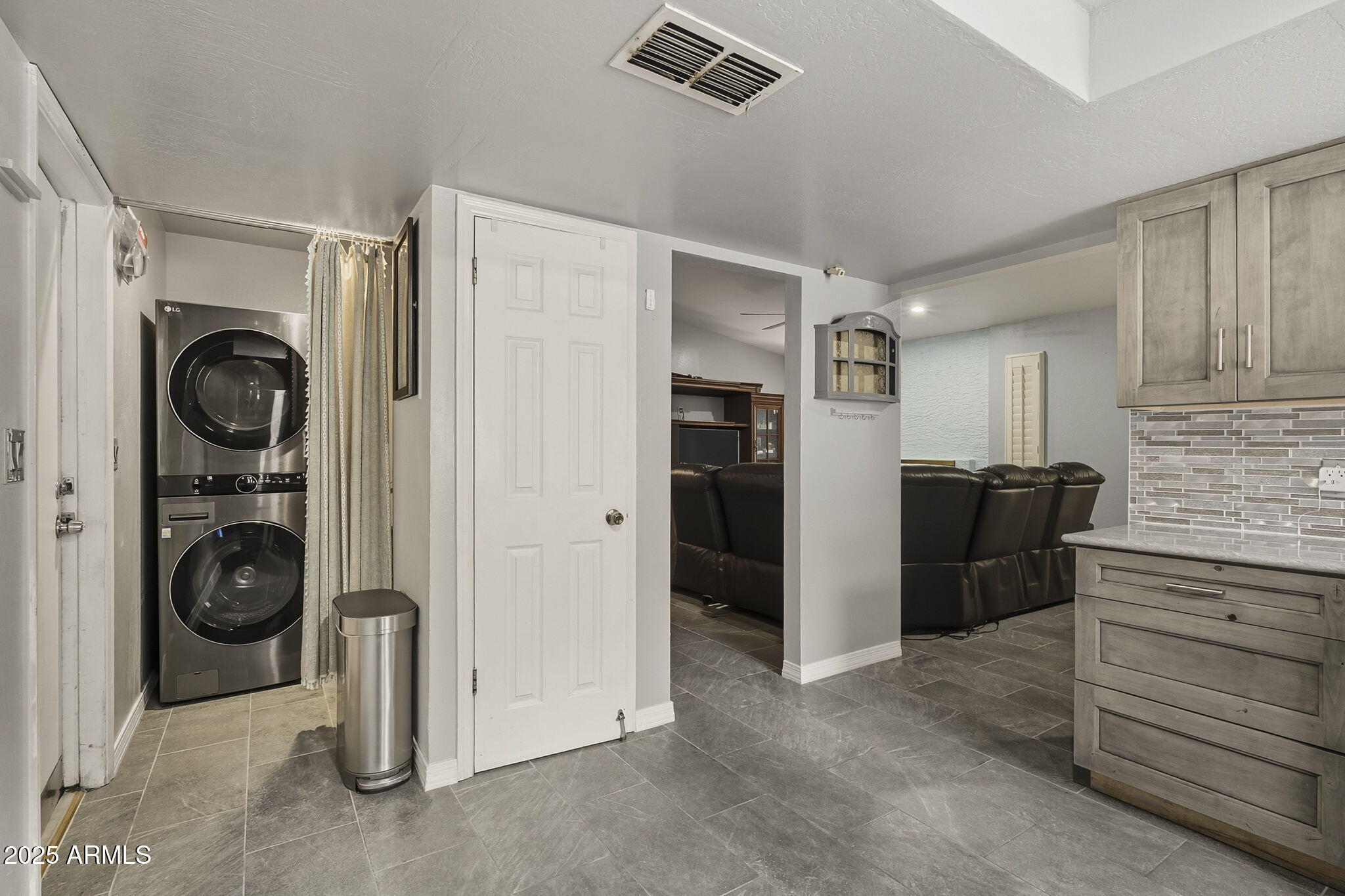 2103 West Palomino Drive Chandler, AZ 85224 - Photo 17 of 46 a view of a kitchen with refrigerator and washer