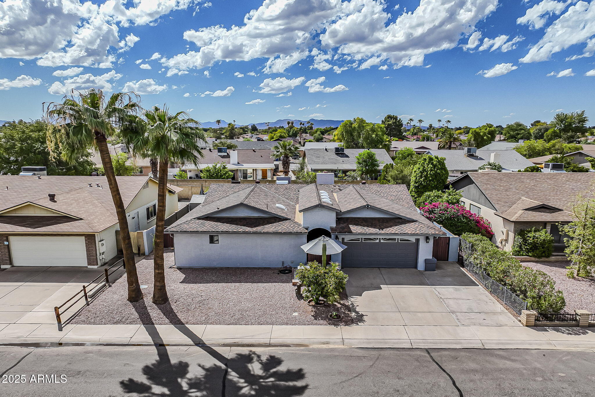 2103 West Palomino Drive Chandler, AZ 85224 - Photo 2 of 46 a picture of houses with outdoor space