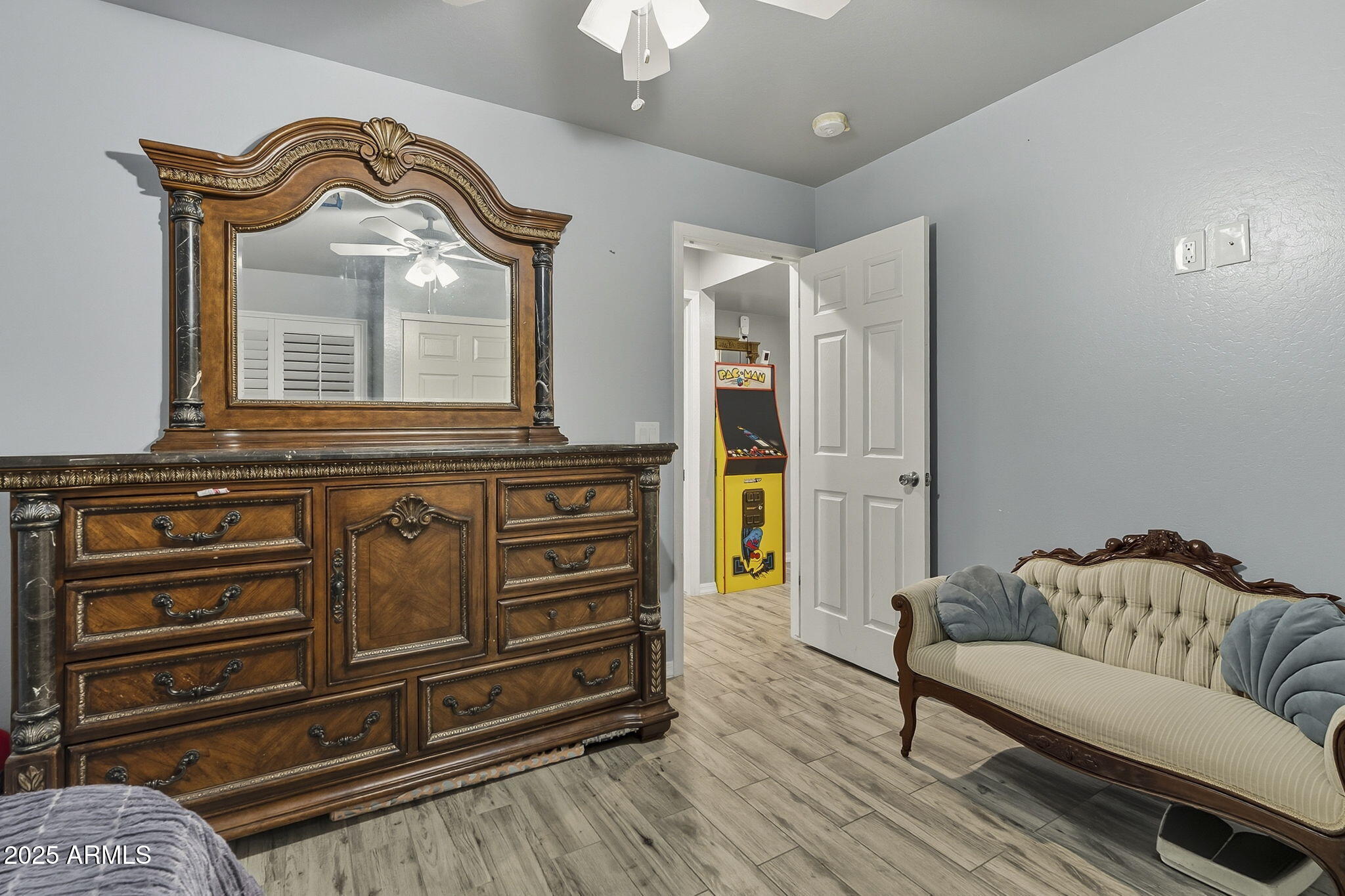 2103 West Palomino Drive Chandler, AZ 85224 - Photo 26 of 46 a living room with furniture and a chandelier