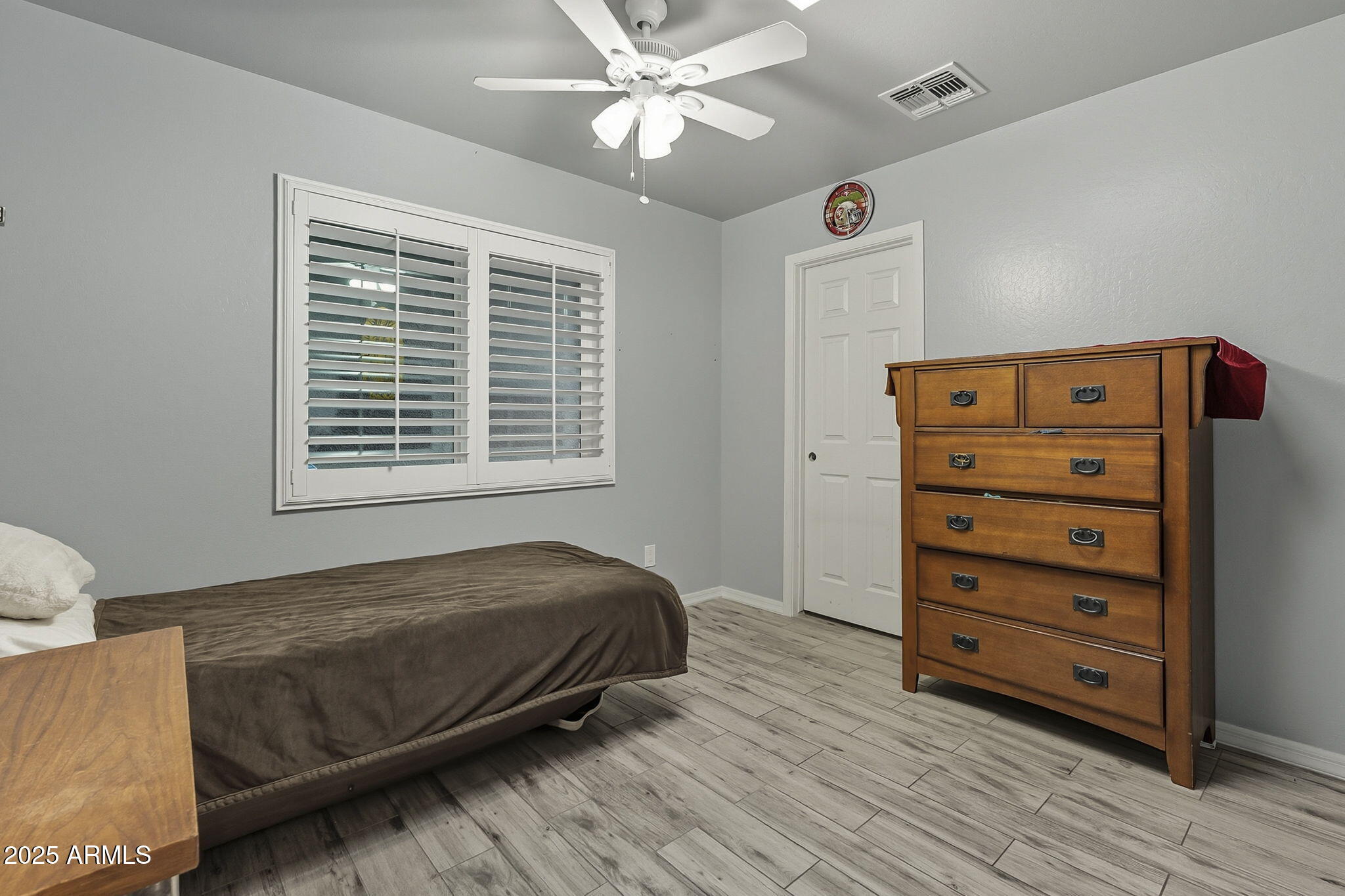 2103 West Palomino Drive Chandler, AZ 85224 - Photo 29 of 46 a bedroom with a bed and a dresser