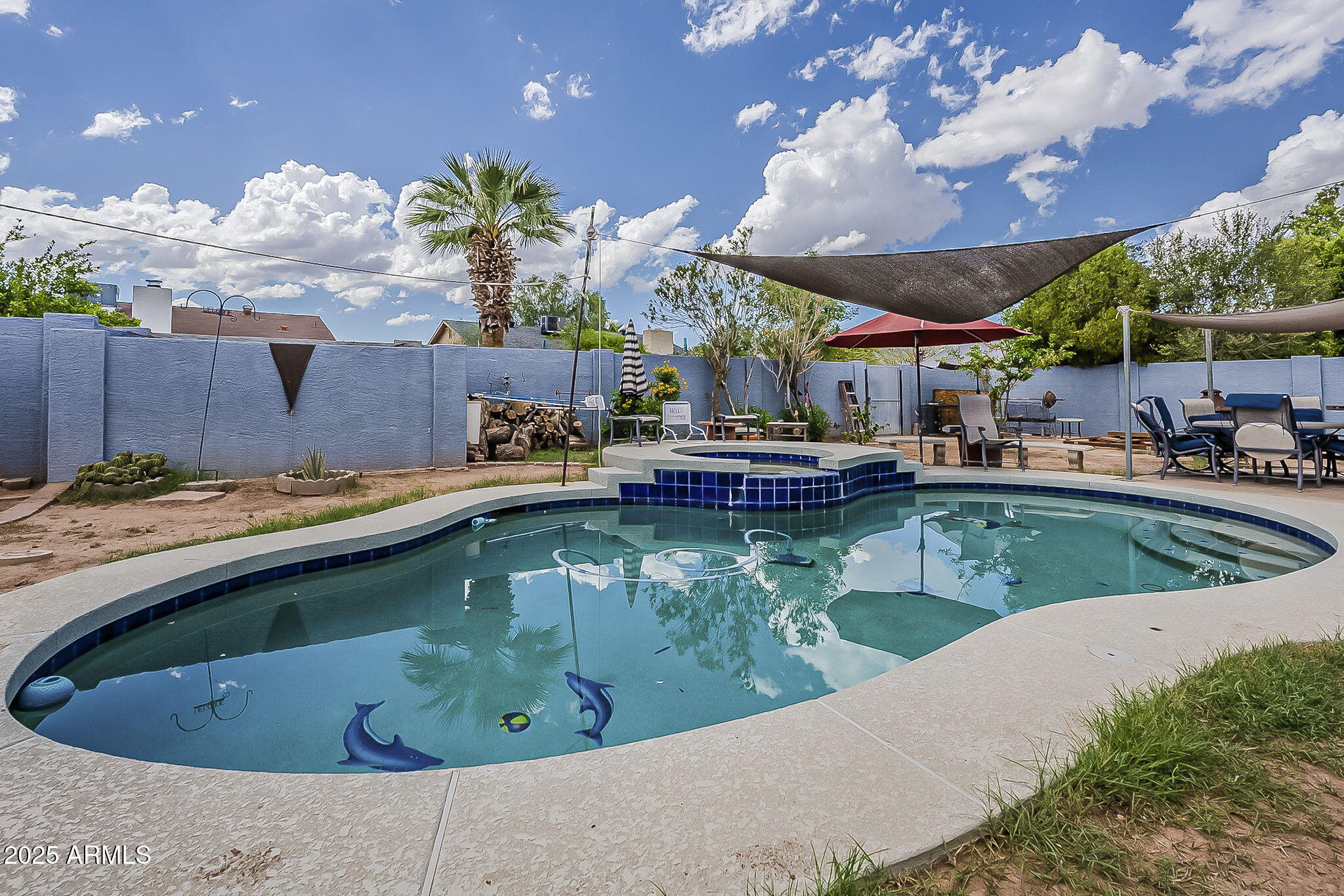 2103 West Palomino Drive Chandler, AZ 85224 - Photo 41 of 46 a view of a swimming pool with a patio