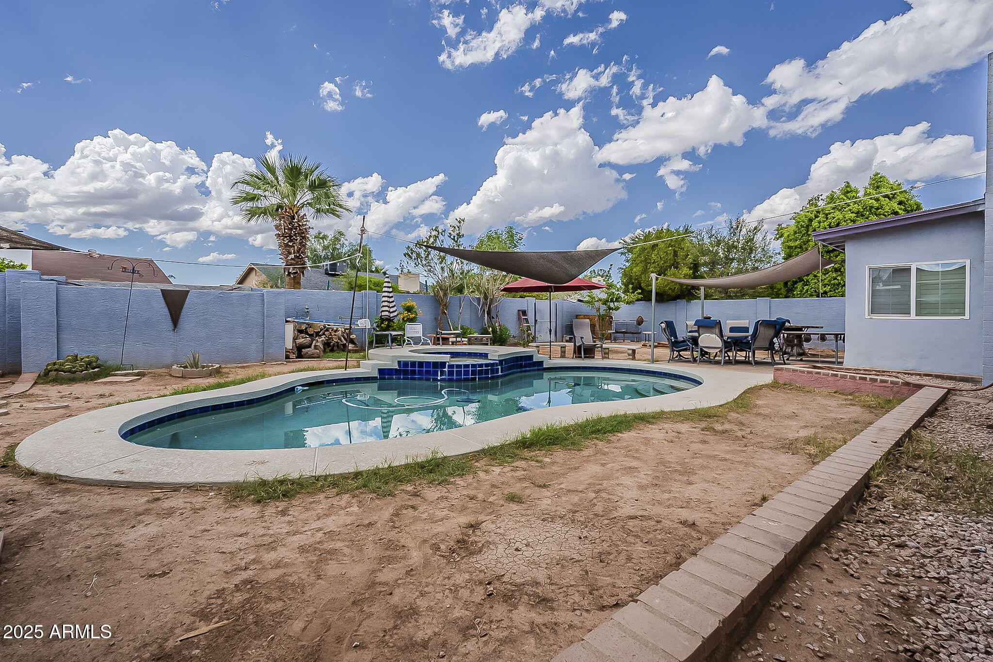 2103 West Palomino Drive Chandler, AZ 85224 - Photo 42 of 46 a view of a house with a yard
