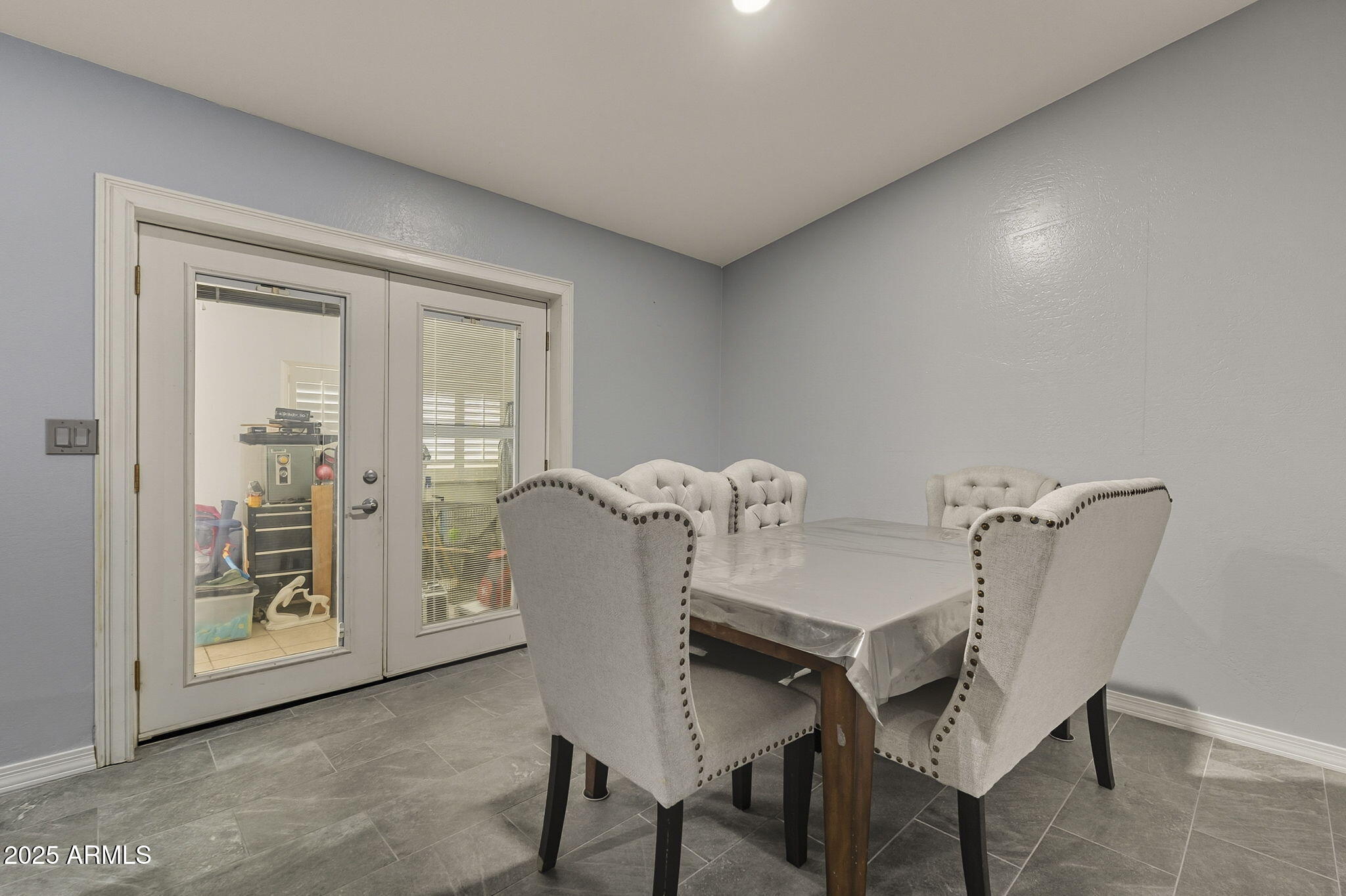2103 West Palomino Drive Chandler, AZ 85224 - Photo 10 of 46 a view of a dining room with furniture and wooden floor