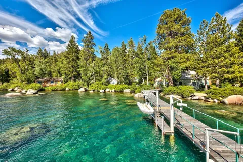 a view of a lake with a building in the background