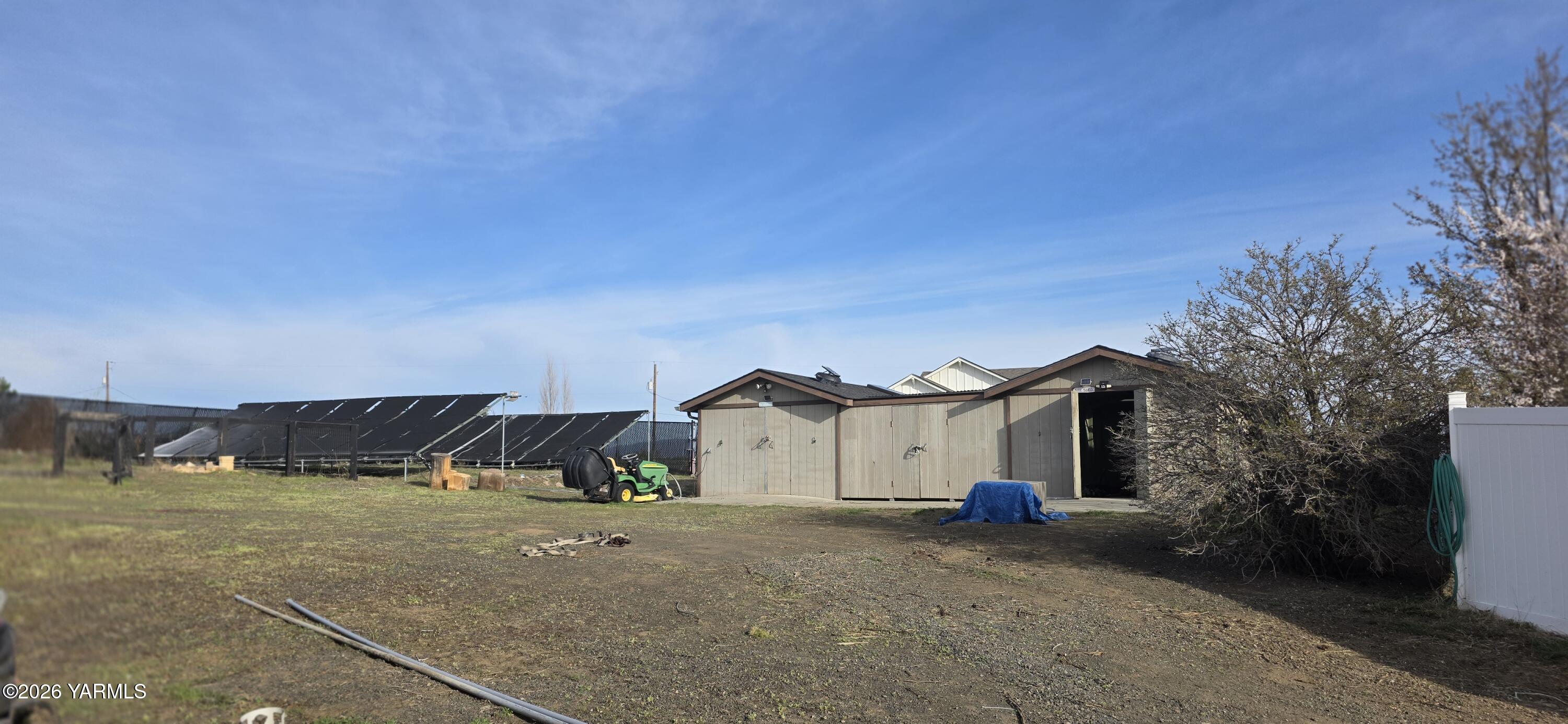 8601 Scenic Drive Yakima, WA 98908 - Photo 22 of 52 a view of a house with a yard and garage