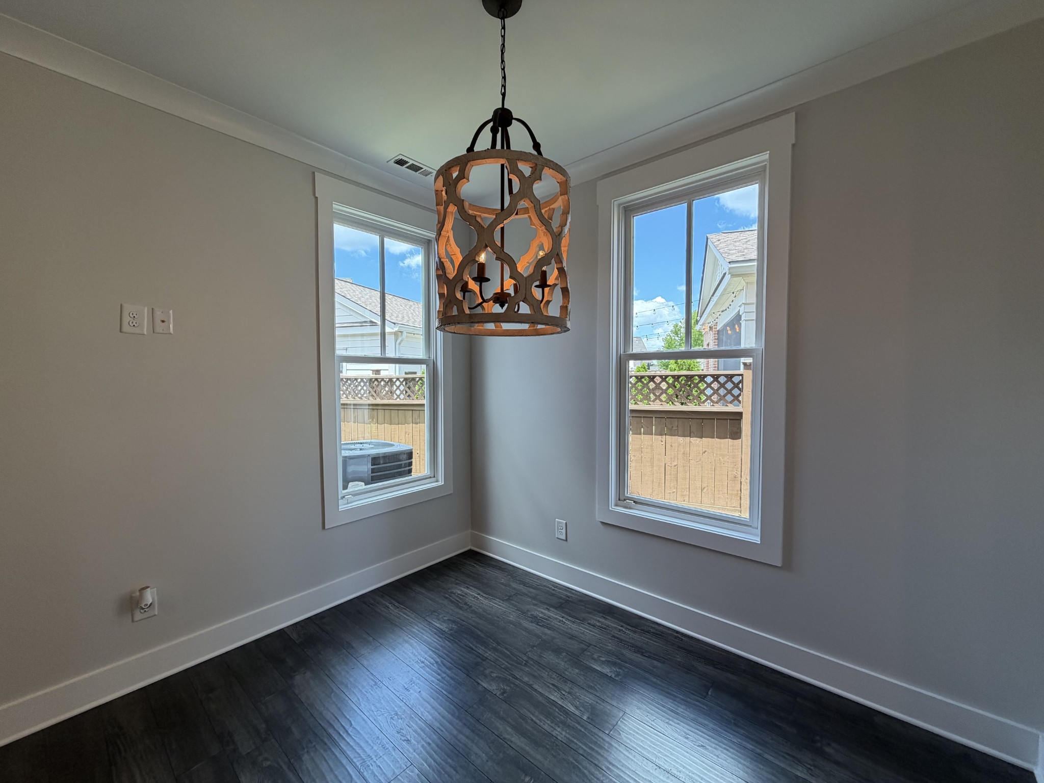 3097 Rural Plains Circle Franklin, TN 37064 - Photo 8 of 28 a window in an empty room with wooden floor and windows