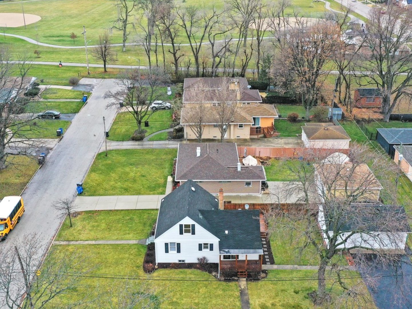 527 Clayton Road Hillside, IL 60162 - Photo 4 of 36 an aerial view of a house with a garden and trees