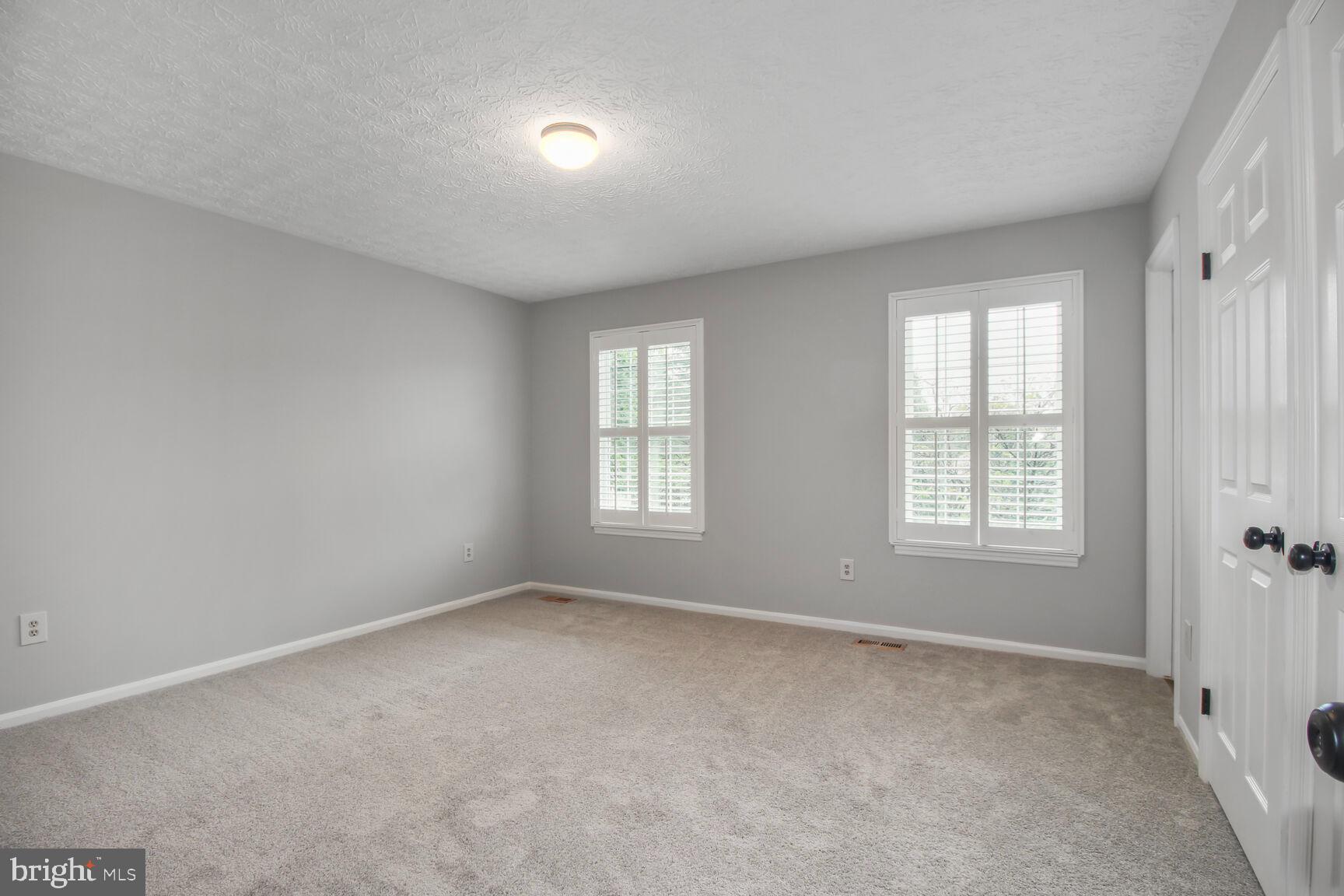 408 Sutton Place Abingdon, MD 21009 - Photo 11 of 26 a view of an empty room with a window