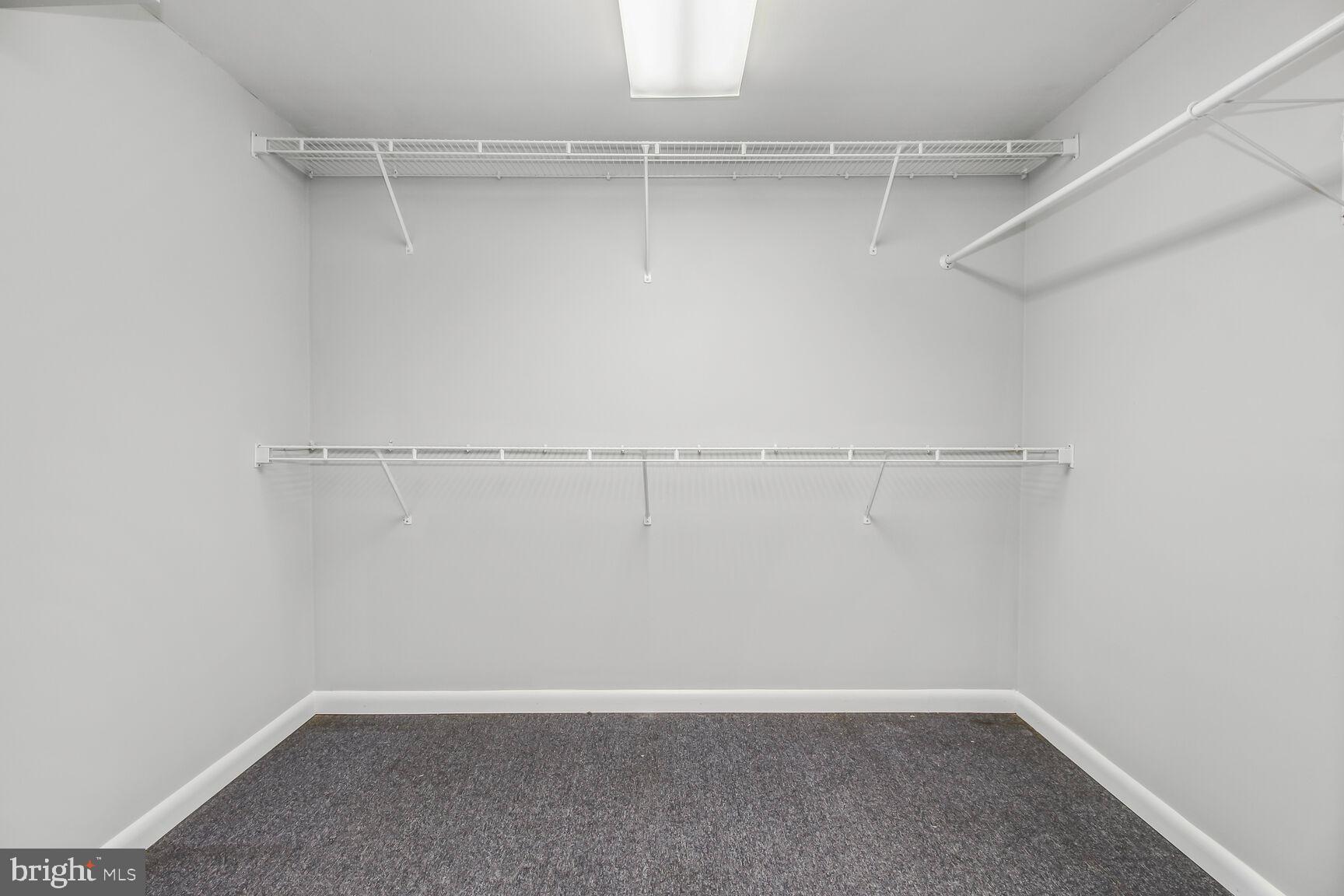 408 Sutton Place Abingdon, MD 21009 - Photo 18 of 26 a view of an empty walk in closet