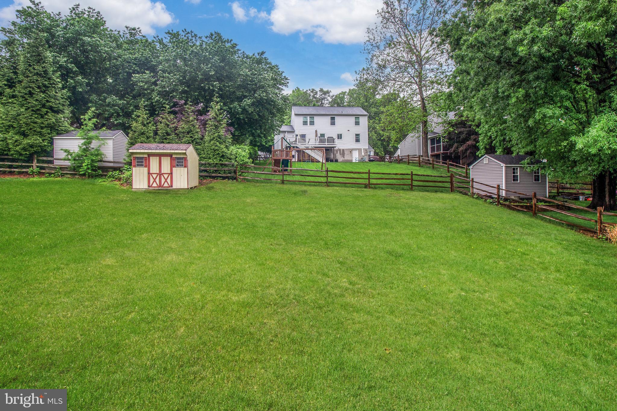 408 Sutton Place Abingdon, MD 21009 - Photo 20 of 26 a view of a house with a big yard