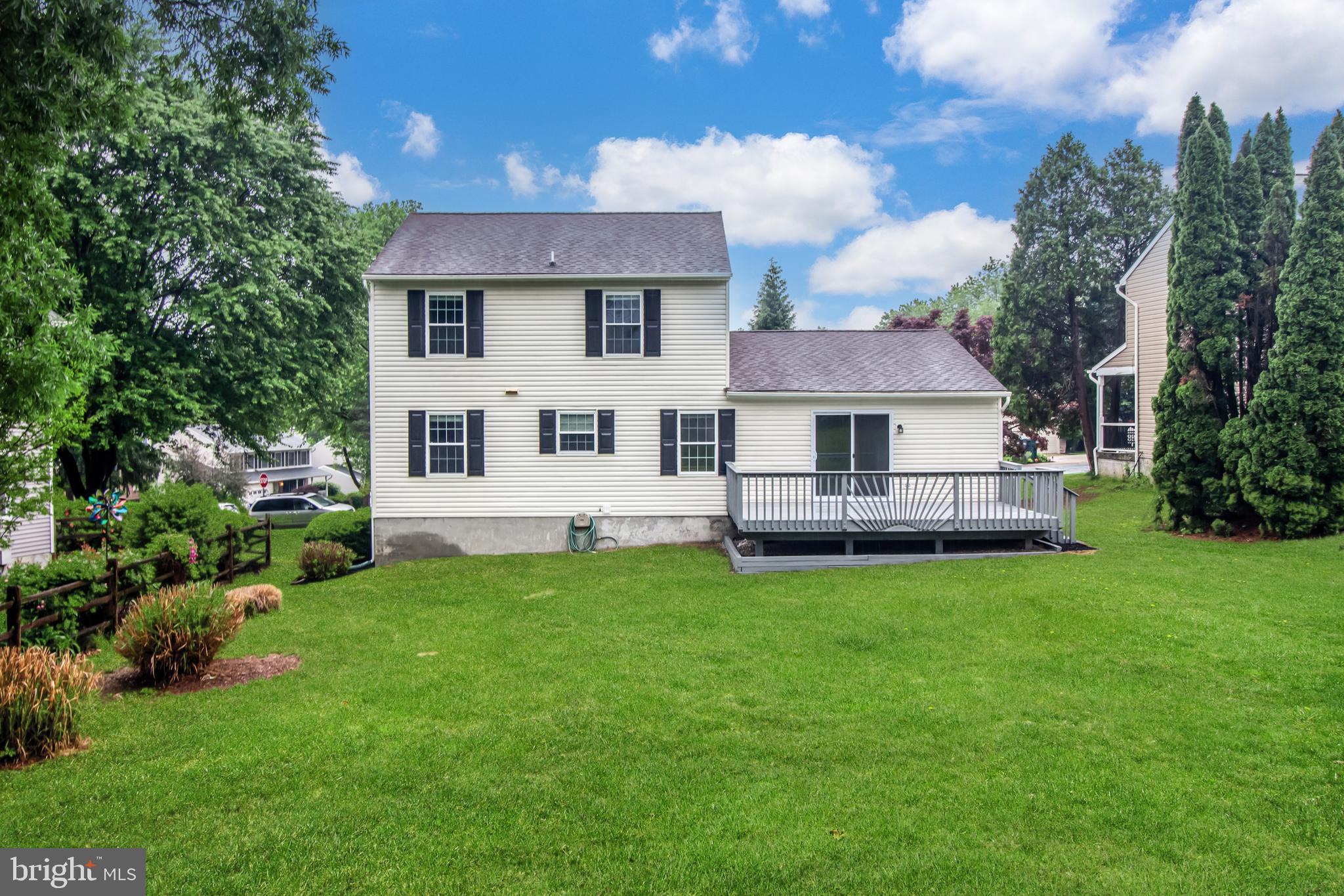 408 Sutton Place Abingdon, MD 21009 - Photo 21 of 26 a front view of a house with a garden