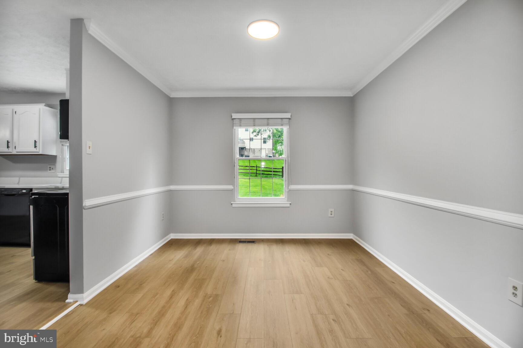 408 Sutton Place Abingdon, MD 21009 - Photo 6 of 26 a view of room with window and hardwood floor