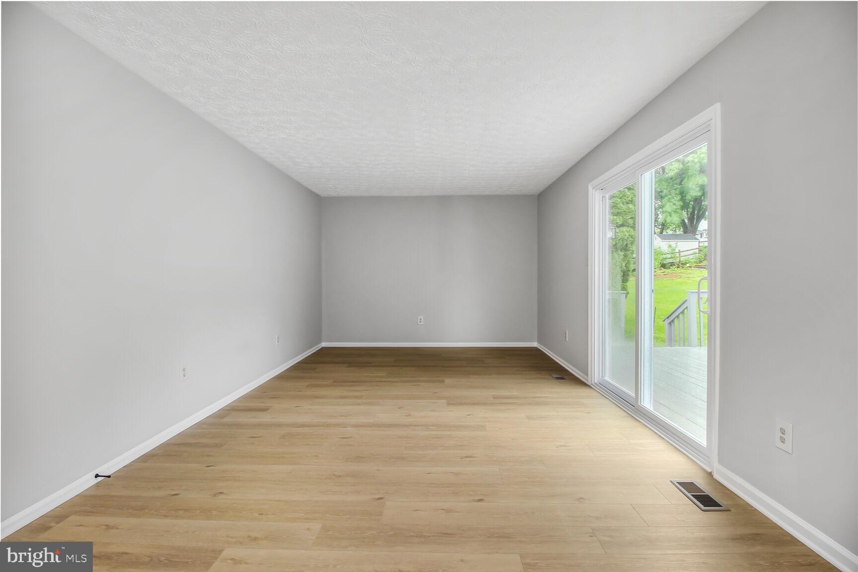 408 Sutton Place Abingdon, MD 21009 - Photo 8 of 26 an empty room with a window