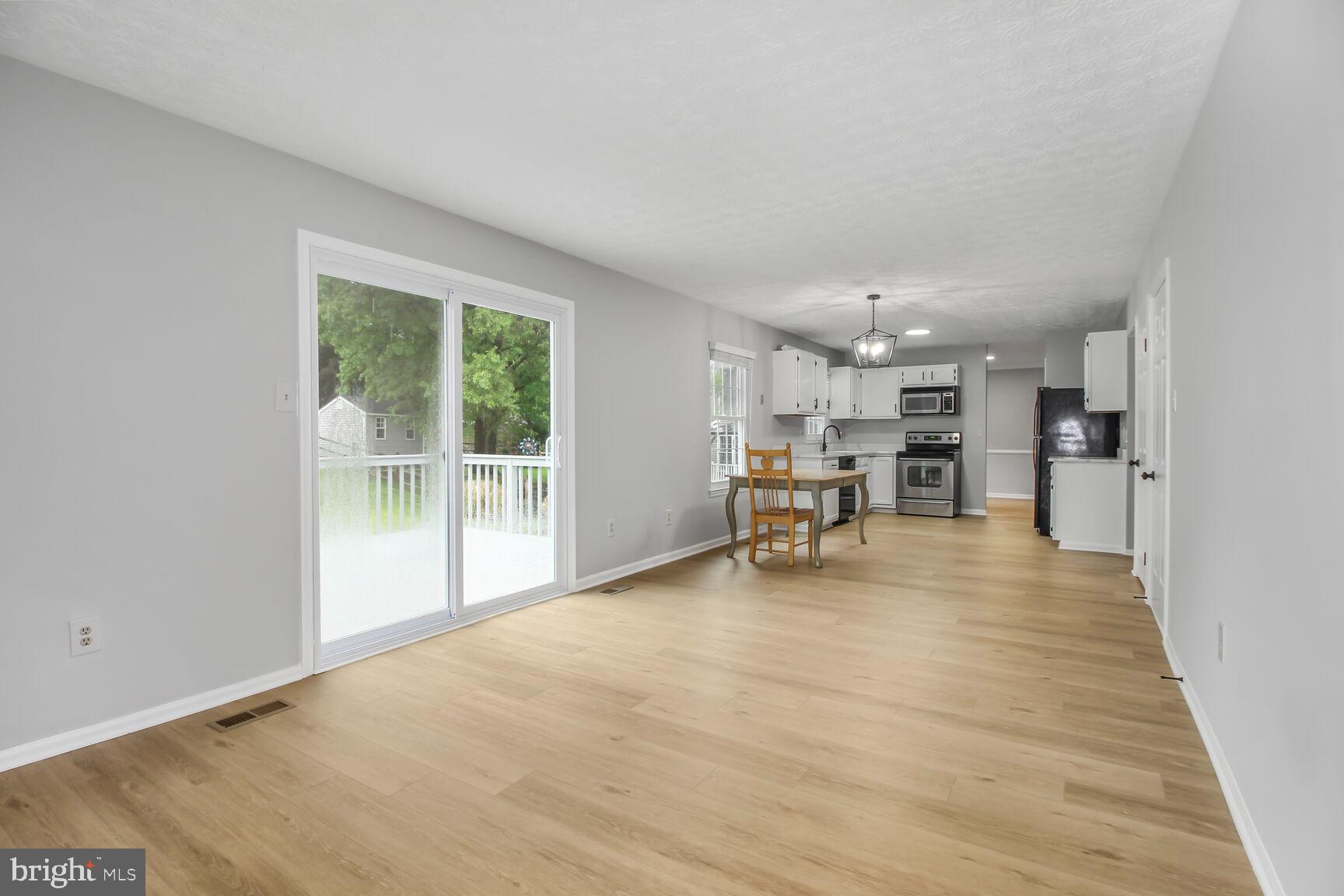 408 Sutton Place Abingdon, MD 21009 - Photo 22 of 26 a view of kitchen with furniture and a refrigerator