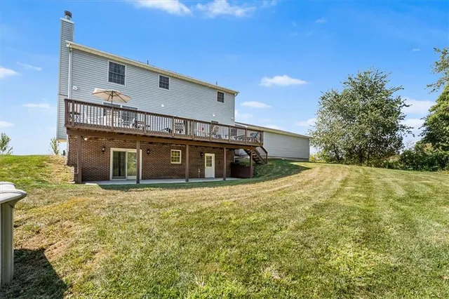 a house with yard in front of it