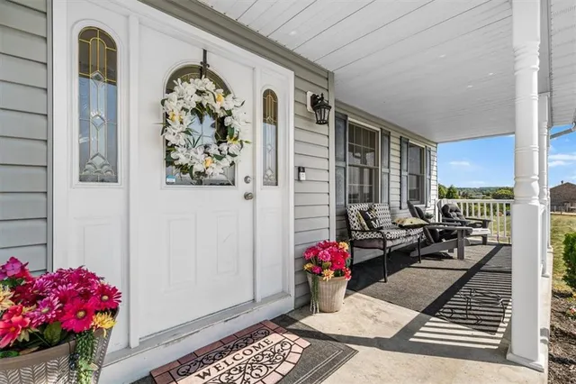 a view of a entryway with flower pots