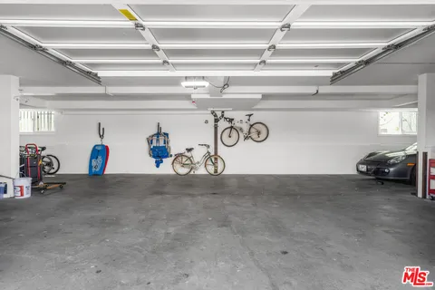 a view of cars parked in a garage