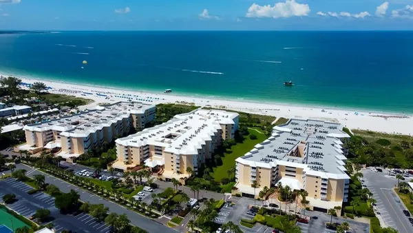 a view of a city with an ocean