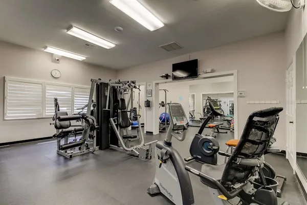 a view of a room with gym equipment