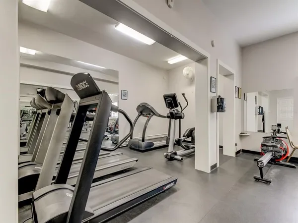 a view of a room with gym equipment