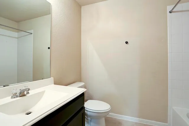 a bathroom with a sink and a toilet