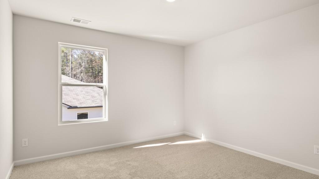 113 Crooked Lk Park Villa Rica, GA 30180 - Photo 21 of 30 an empty room with a window