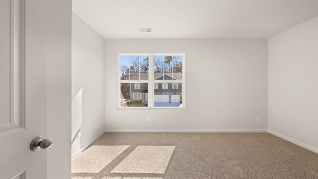 113 Crooked Lk Park Villa Rica, GA 30180 - Photo 23 of 30 an empty room with windows