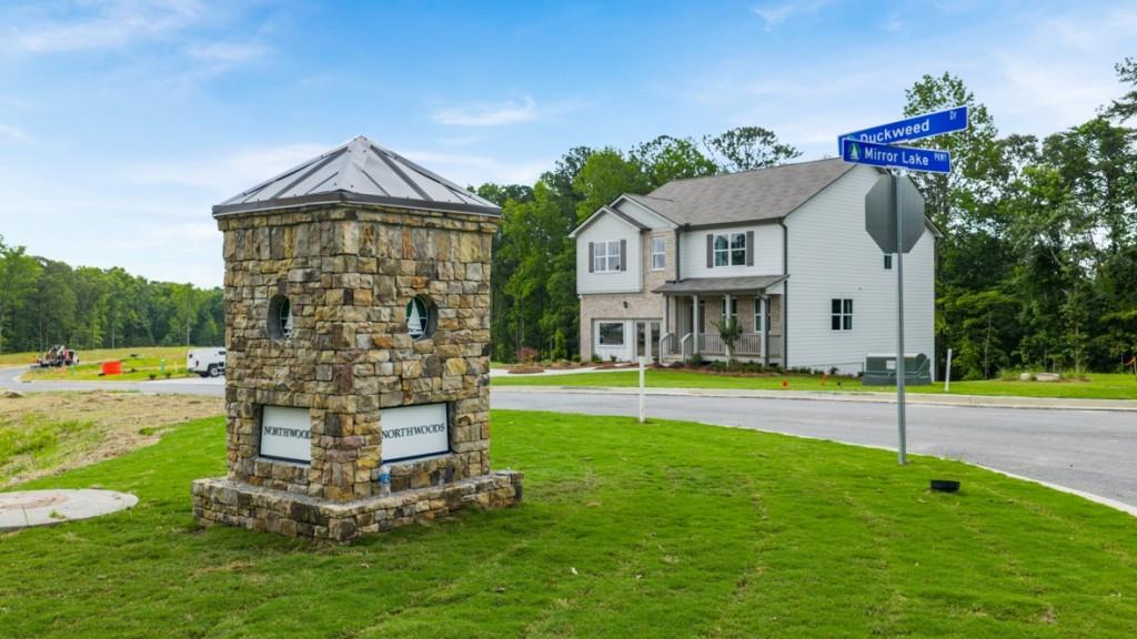 113 Crooked Lk Park Villa Rica, GA 30180 - Photo 26 of 30 a front view of a house with a yard