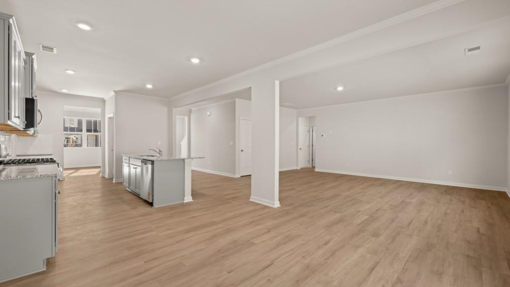 113 Crooked Lk Park Villa Rica, GA 30180 - Photo 8 of 30 a view of kitchen with furniture and wooden floor