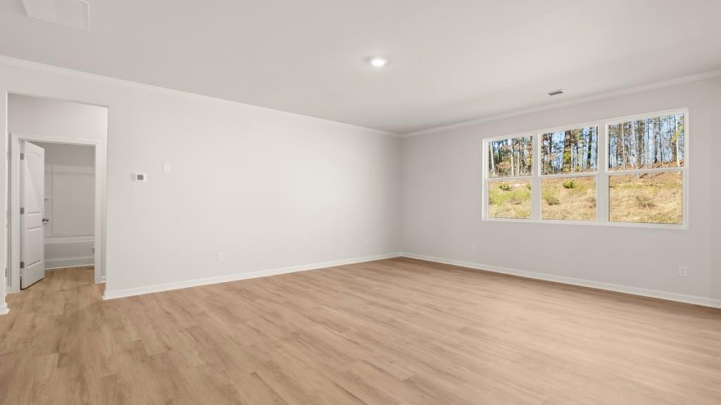 113 Crooked Lk Park Villa Rica, GA 30180 - Photo 9 of 30 an empty room with windows