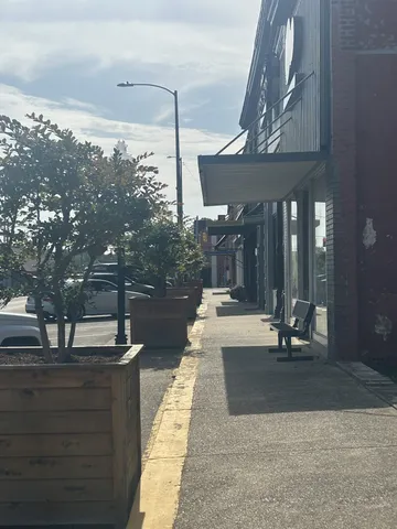 a view of a street with cars