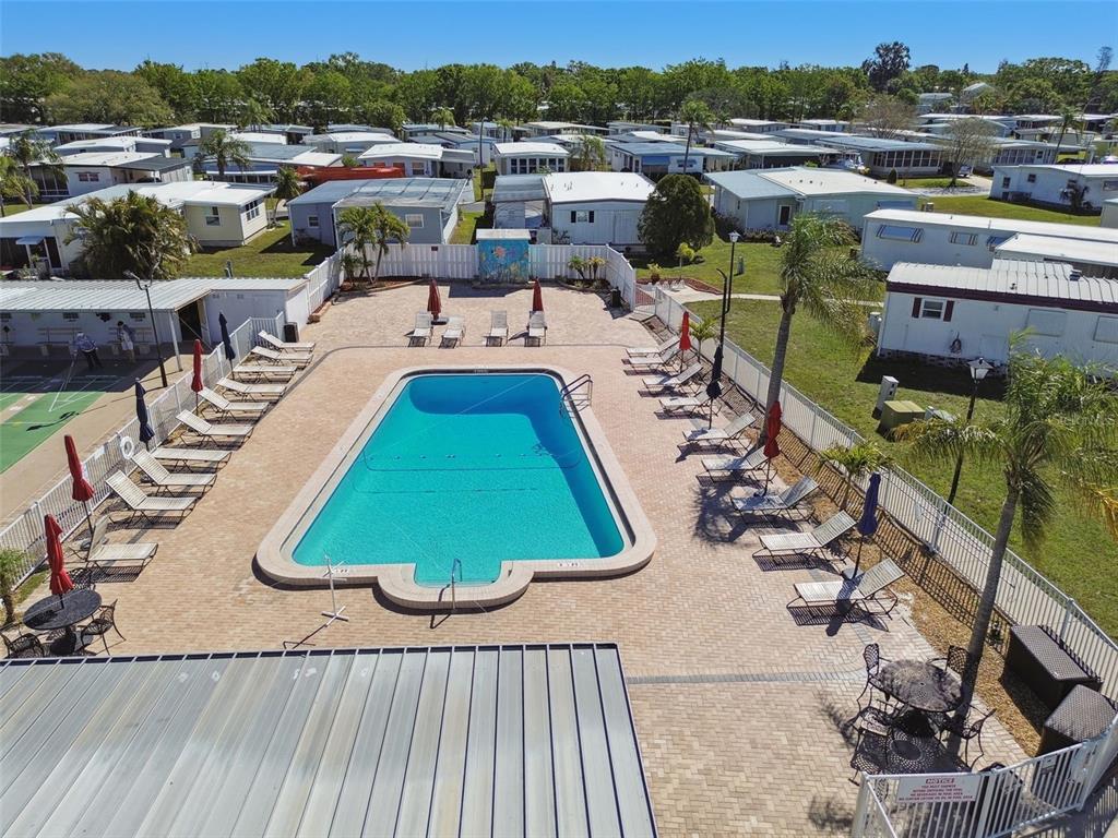 13225 101st Street Southeast, Unit 222 Largo, FL 33773 - Photo 71 of 73 an aerial view of a house with a yard