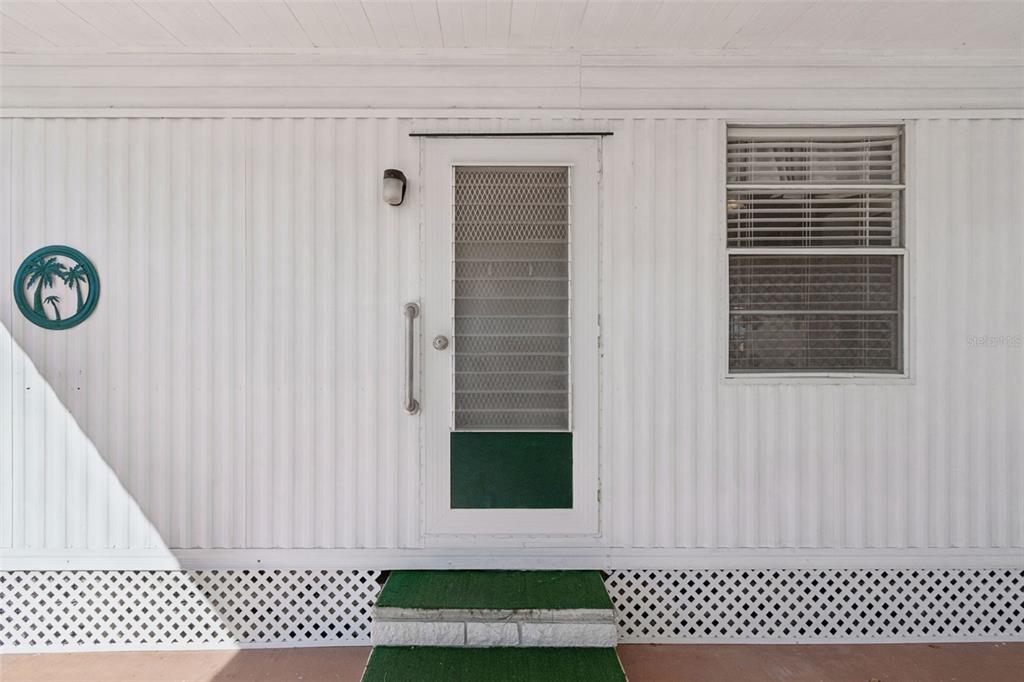 13225 101st Street Southeast, Unit 222 Largo, FL 33773 - Photo 8 of 73 a view of a door side of a house