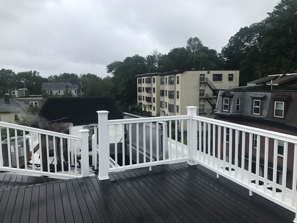 140 Marcella Street, Unit 4 Boston, MA 02119 - Photo 14 of 14 a view of a wooden bridge
