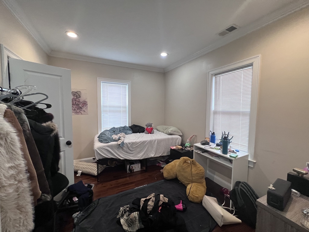 140 Marcella Street, Unit 4 Boston, MA 02119 - Photo 10 of 14 a living room with furniture and a window