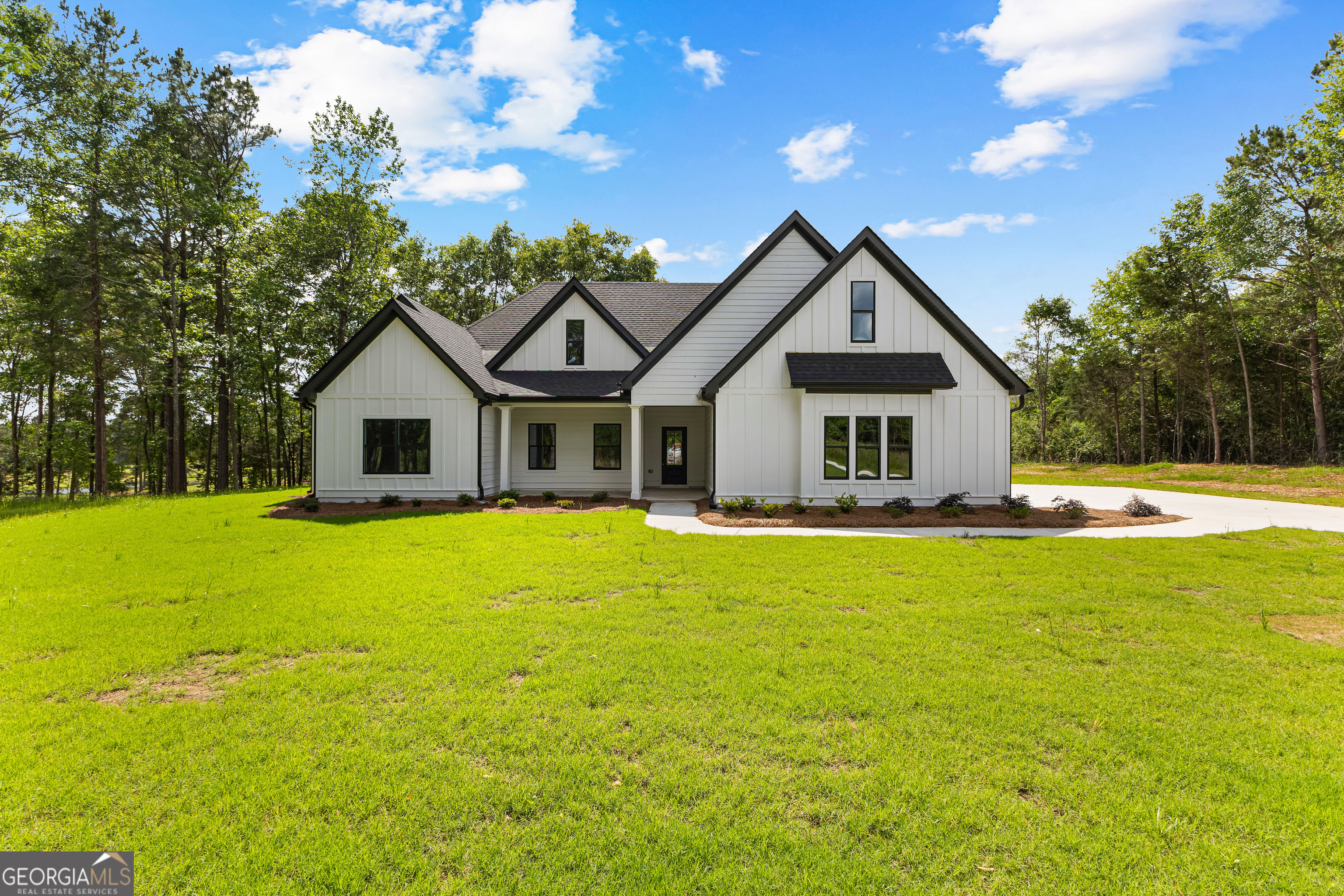1210 Waymanville Road Thomaston, GA 30286 - Photo 1 of 45 a front view of house with yard and green space